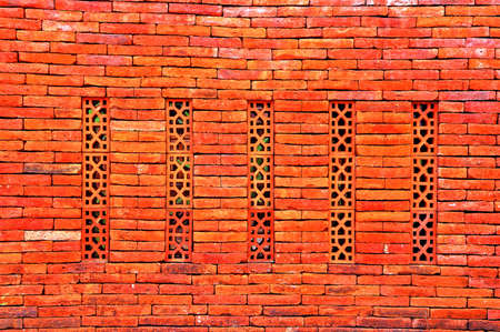 a piece of artistic terracotta wall の写真素材