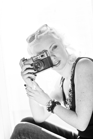 woman photographer with cameraの写真素材
