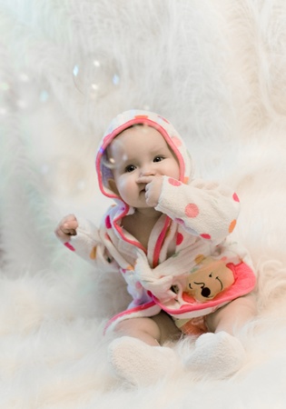 baby girl and bubblesの写真素材