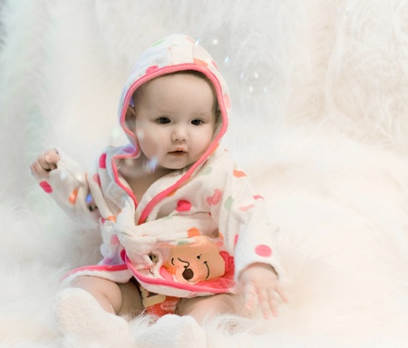 baby girl and bubblesの写真素材