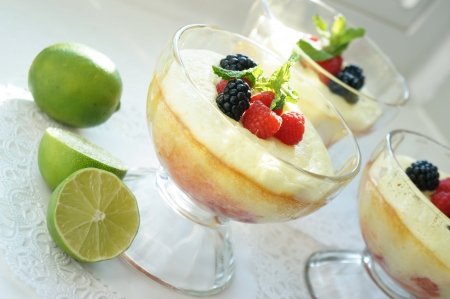 Gourmet dessert- strawberry souffle with lemon liquire and berriesの写真素材