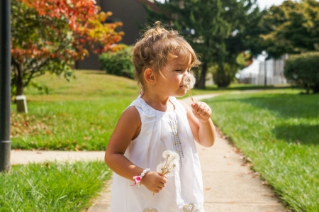 cute baby girl in the forestの写真素材
