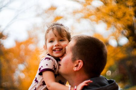father and daughter in the parkの写真素材