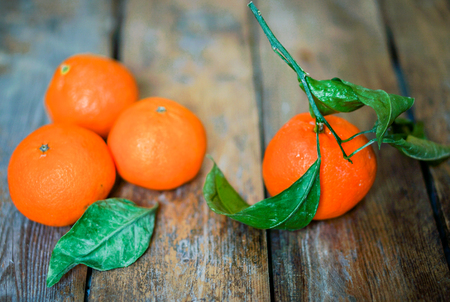 clementines on wooden backgroundの写真素材