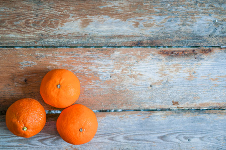 clementines on wooden backgroundの写真素材