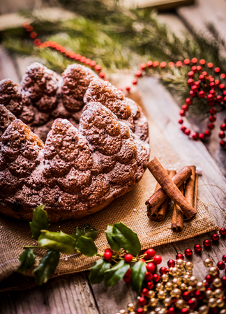 Christmas cake on wooden backgroundの写真素材