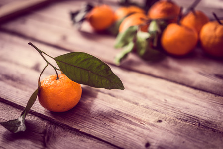 Tangerines on rustic backgroundの写真素材