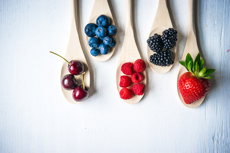 Berries on wooden backgroundの写真素材
