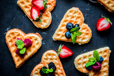 Heart waffles with berriesの写真素材