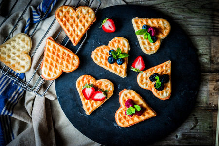Heart waffles with berriesの写真素材