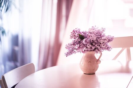Bouquet of lilacs on wooden backgroundの写真素材