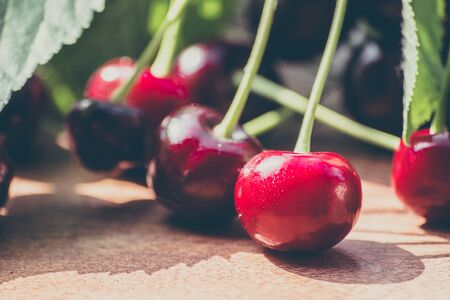 Cherries on wooden backgroundの写真素材