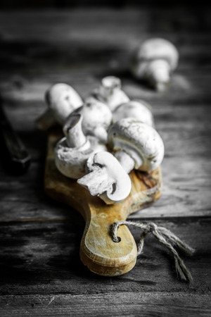 Closeup of mushrooms on wooden backgroundの写真素材