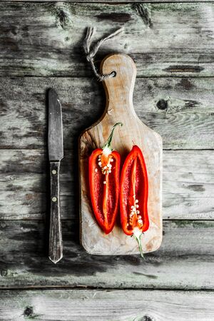 Colorful peppers on rustic backgroundの写真素材