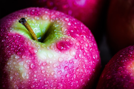Macro shoot of an apple with drops of water on it