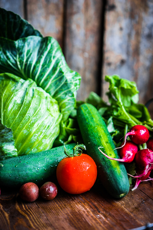 Fresh vegetables on wooden backgroundの写真素材