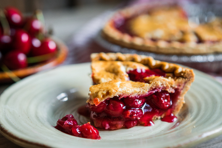 Homemade cherry pie on rustic backgroundの写真素材