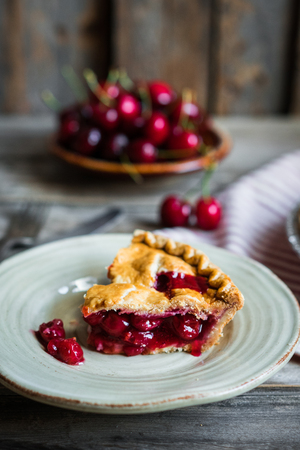 Homemade cherry pie on rustic backgroundの写真素材