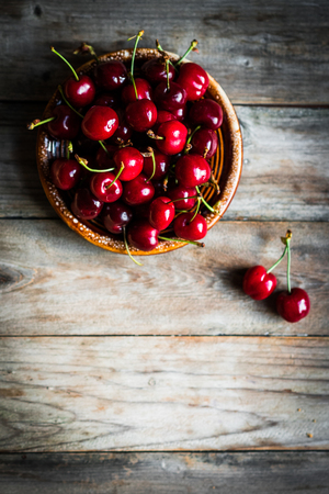 Sweet cherries on rustic wooden backgroundの写真素材