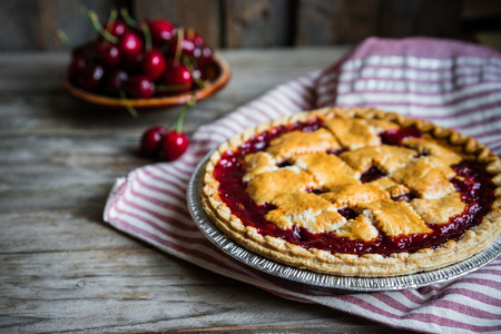 Homemade cherry pie on rustic backgroundの写真素材