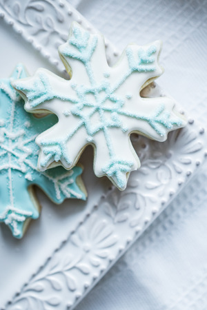 Snowflake cookies on white pastel backgroundの写真素材