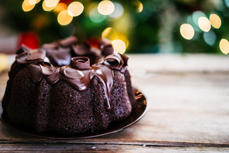 Chocolate cake on rustic wooden backgroundの写真素材