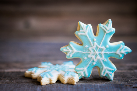 Snowflake cookies on wooden backgroundの写真素材