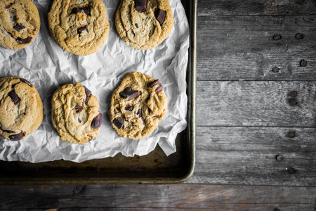 Chocolate chip cookies on rustic backgroundの写真素材