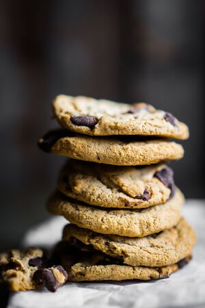 Chocolate chip cookies on rustic backgroundの写真素材