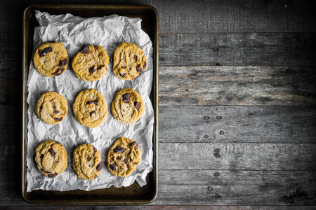 Chocolate chip cookies on rustic backgroundの写真素材