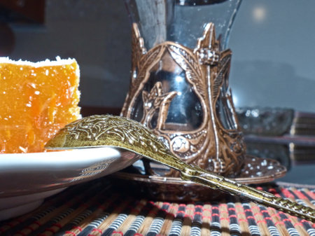 Traditional coffee with orange marmalade on a white plateの写真素材