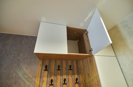 Open shelf for clothes in the dressing room.の写真素材