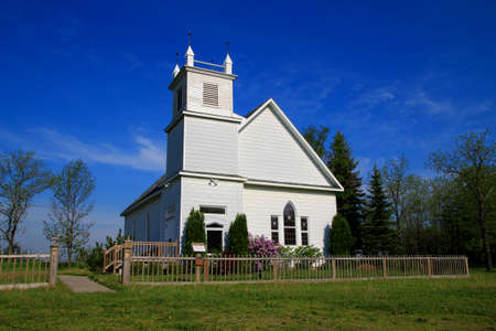 Restored church with a gorgeous blue sky background  Port Sanilac Historical Village  Port Sanilac, Michigan の写真素材