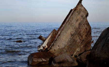 Hull of a wooden sailboat beached on the coast of Lake Huron  Sanilac County Park  Lexington, Michigan の写真素材