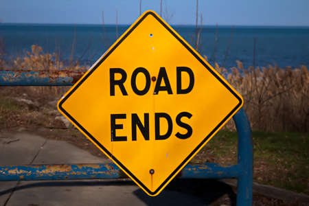 Road Ends  Warning to drivers as the road abruptly ends at the beautiful shores of Lake Huron  Port Sanilac, Michigan の写真素材