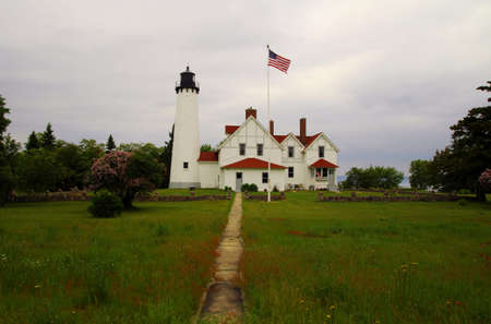 Where the Sidewalk Ends  Point Iroquois Lighthouse located in Michigan s Upper Peninsula  This lighthouse is owned and operated by the National Forest Service の写真素材