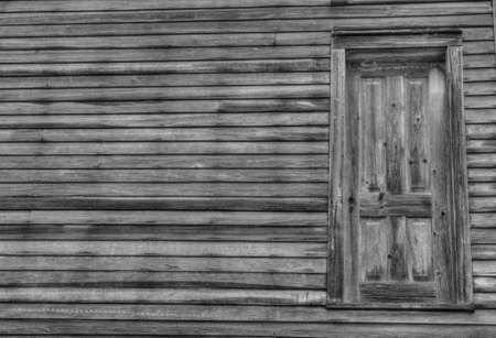 Door To Nowhere  Historic wooden home with doorway lacking stairs  Fayette State Historic Park  Fayette, Michigan  の写真素材