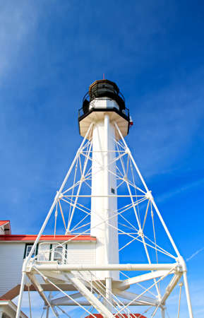 Whitefish Point lighthouse stands guard on the isolated Lake Superior shoreline  This shoreline is notoriously dangerous and due to so many shipwrecks is referred to as the Graveyard Coast  Great Lakes Shipwreck Museum  Whitefish Point, Michigan の写真素材
