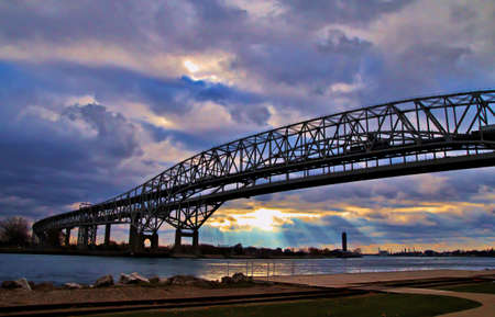 Good Morning Ontario  Beams of light illuminate the Canadian shore with the Blue Water Bridges in...