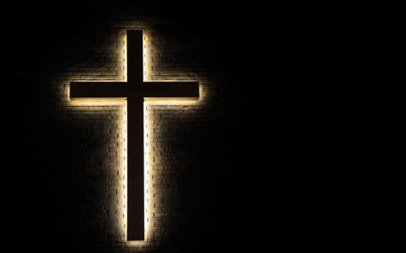 Light of the World   Illuminated cross on a brick wall の写真素材