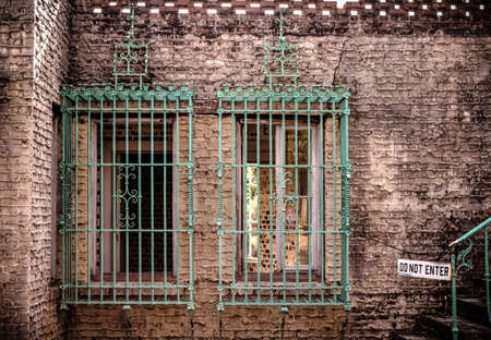 Haunting exterior of Moorish styled Atalaya Castle, complete with barred windows and a do not enter sign  Huntington Beach State Park  South Carolinaの写真素材