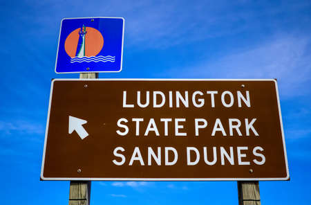 Directional sign pointing the way to Ludington State Park; the most popular state park in the state of Michigan  のeditorial素材