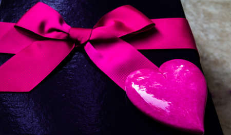 Pink heart and gift box with bow  の写真素材