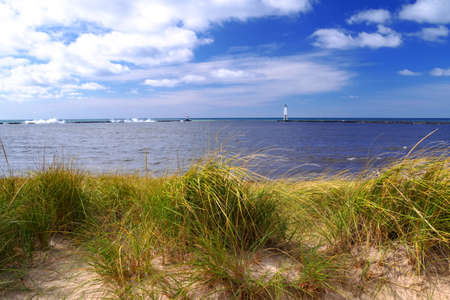 Lazy summer afternoon in paradise, with sunny blue skies and beautiful blue water horizon.の写真素材