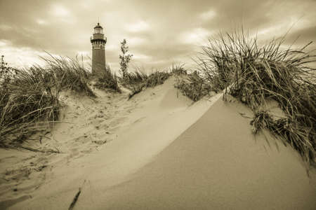 The Little Sable Lighthouse with a freshwater dune in the foreground. Silver Lake State Park. Pentwater, Michigan.の写真素材
