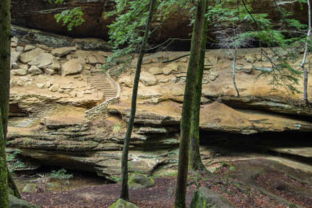Ancient stone staircase leads to nowhere in Hocking Hills State Park. Logan, Ohio.の写真素材