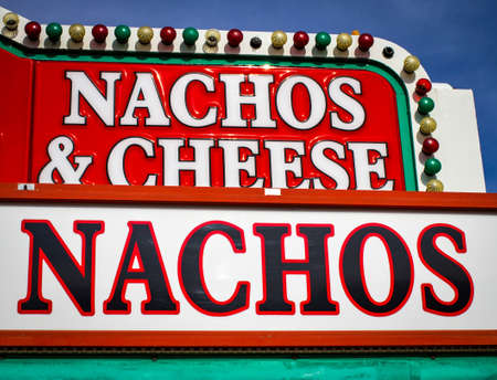 Carnival Food. Vintage sign advertising nachos and cheese.