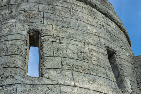Castle Turret. Castle turret and windows set against a clear blue sky.のeditorial素材