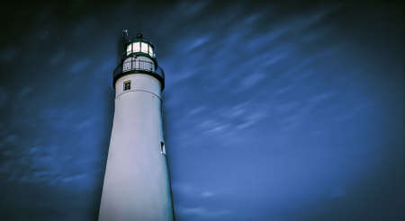 Night sky at the Fort Gratiot Lighthouse. This is the oldest lighthouse in Michigan and is located in Port Huron, Michigan. It remains an active navigational beacon for Great Lakes mariners.の写真素材