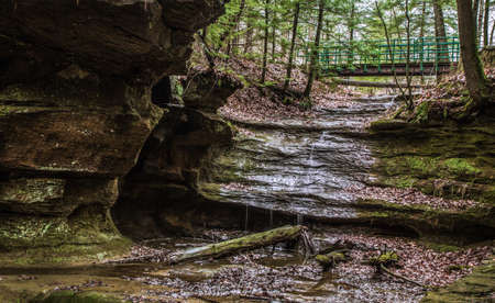 Small seasonal waterfall in the canyon of the Old Mans Cave area of Hocking Hills State Park. Logan, Ohio.の写真素材